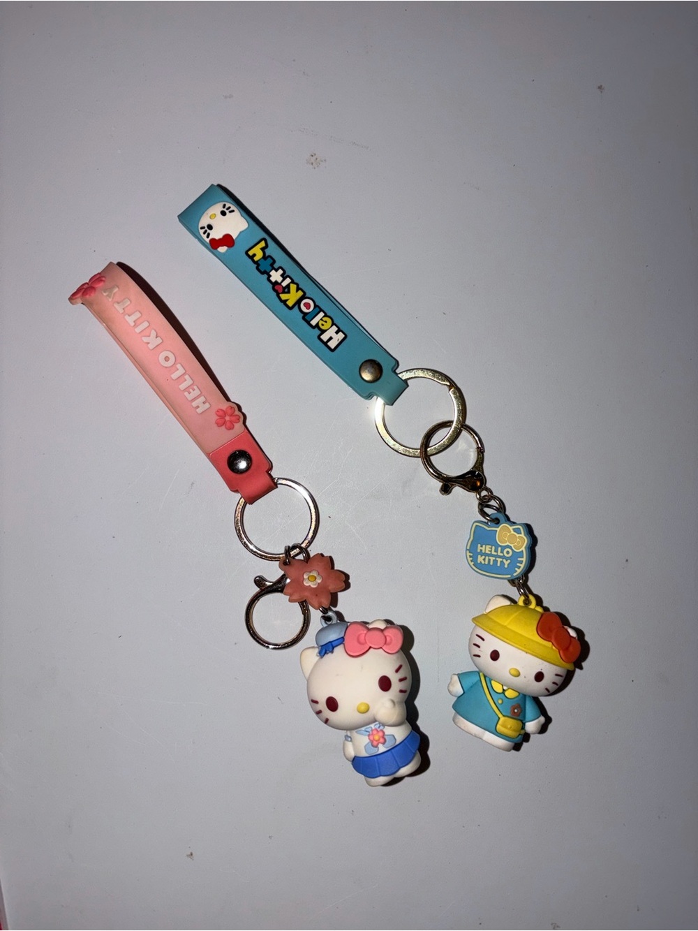 Hello Kitty Keychain Pair - Pink and Blue Silicone Charms